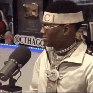 a GIF of Soulja Boy being shocked and walking off"